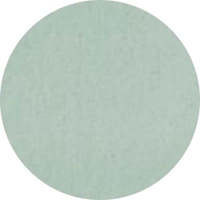 A circular swatch of a green bed sheet