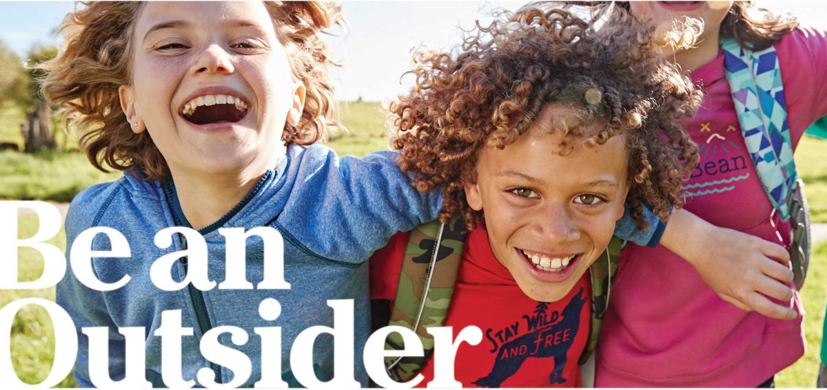 3 smiling kids arm-in-arm wearing L. L. Bean backpacks. Be an Outsider.