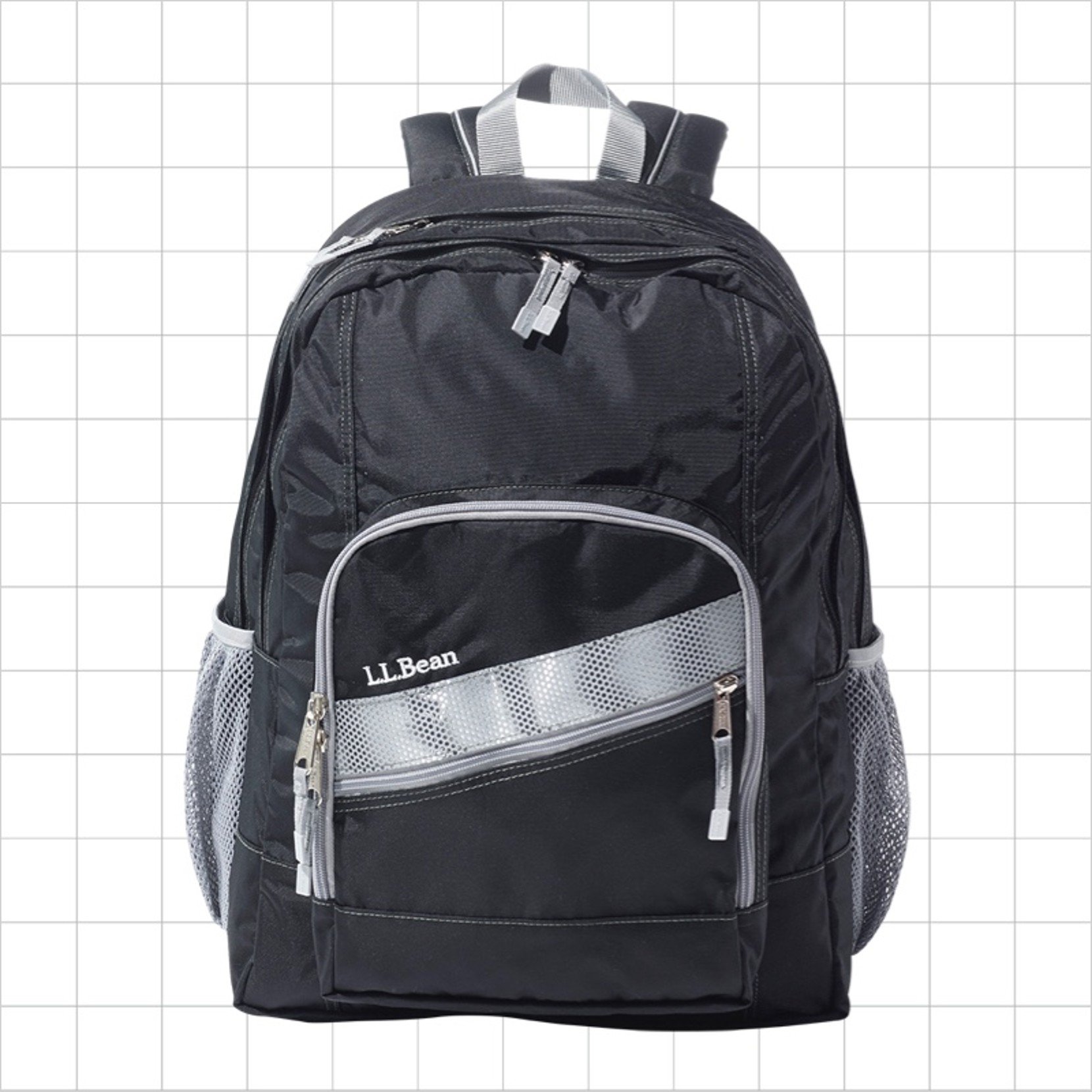 A black school backpack with a diagonal reflective strip on the front pocket.