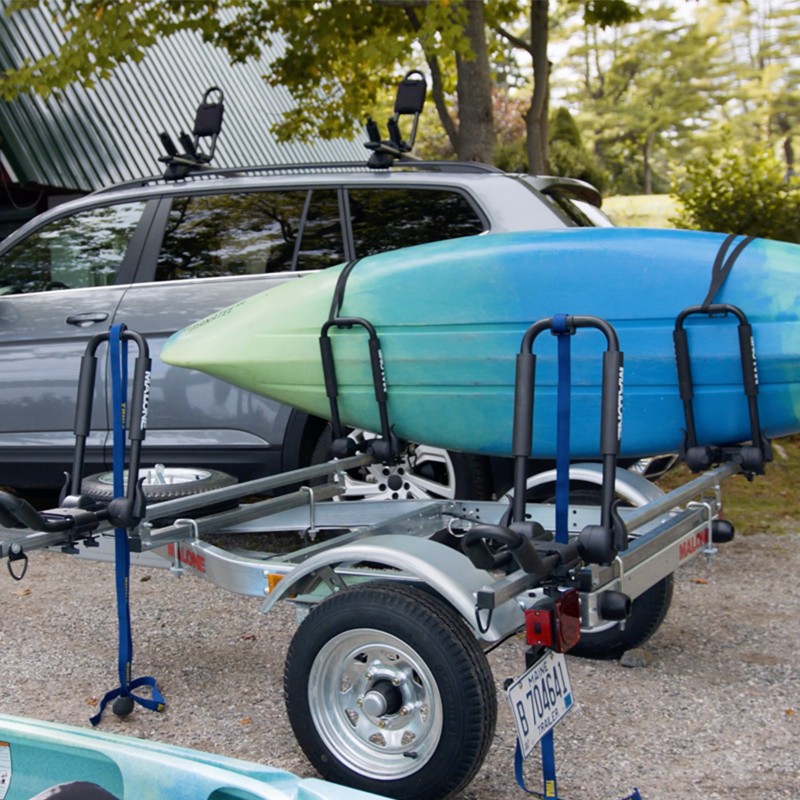 A kayak loaded onto a trailer.