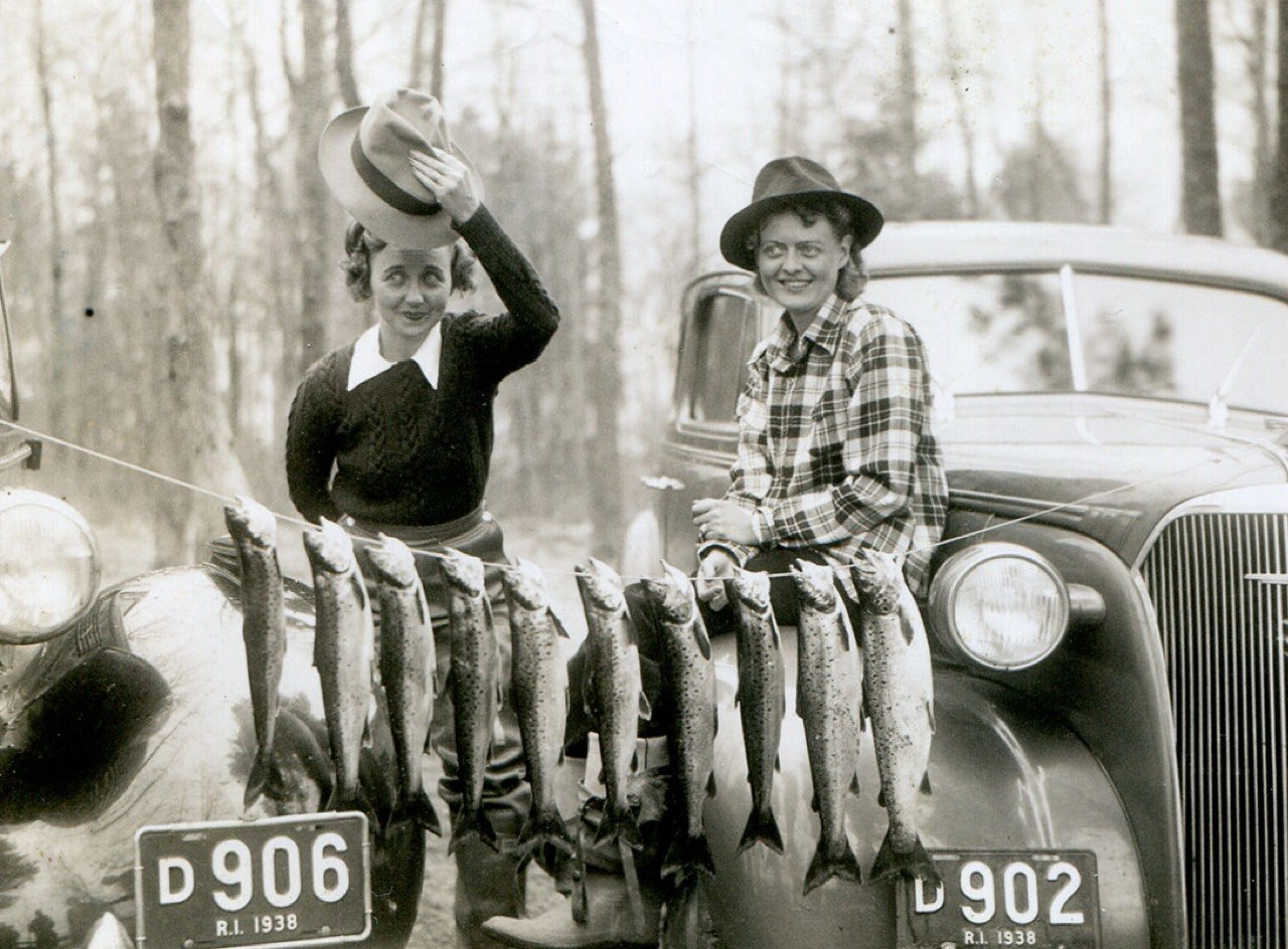 Atha Inerson and Hazel Bean with fish they've caught.