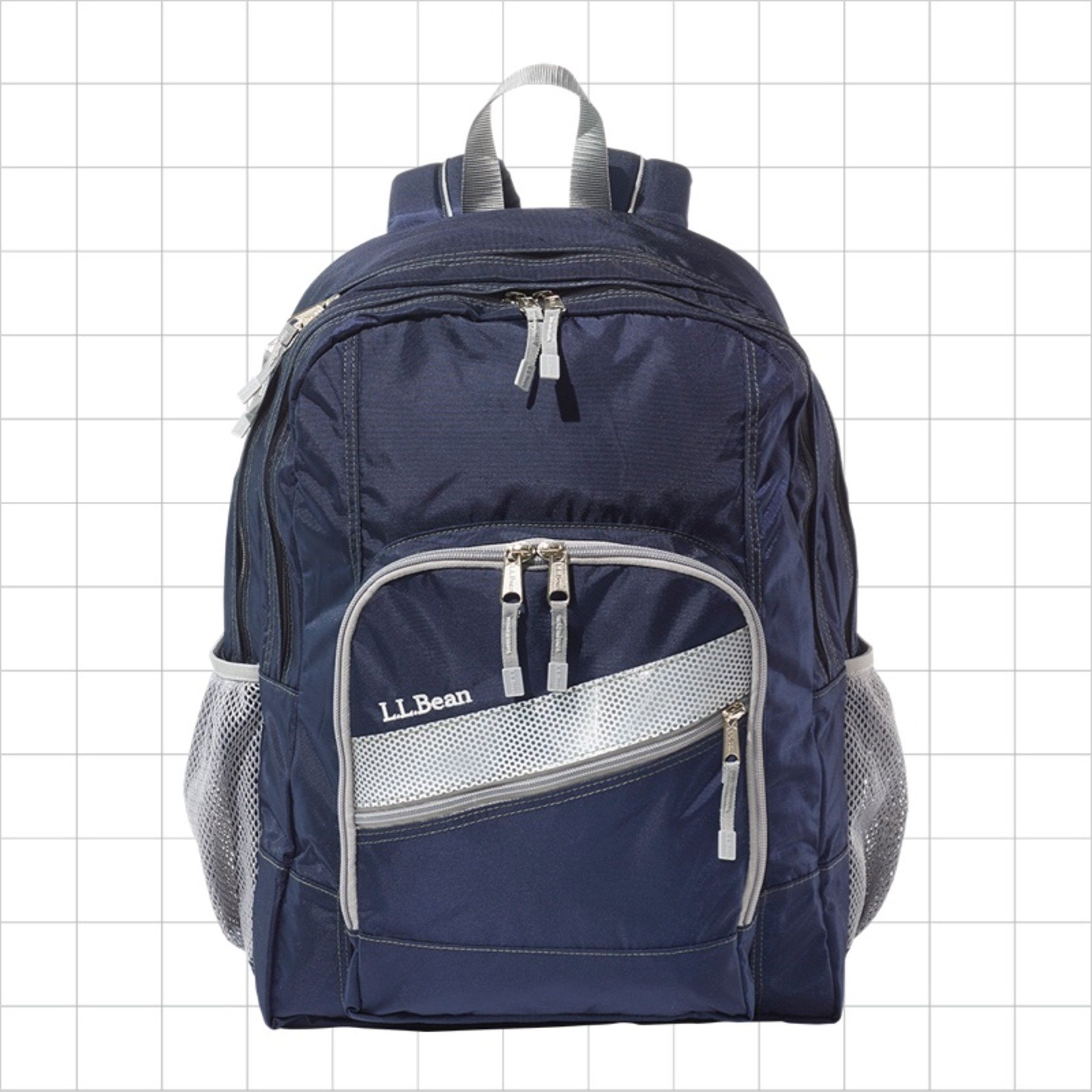 A navy bue school backpack with a diagonal reflective strip on the front pocket.